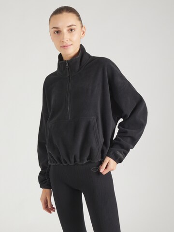 Pull-over 'NO CHILL' Fabletics en noir : devant
