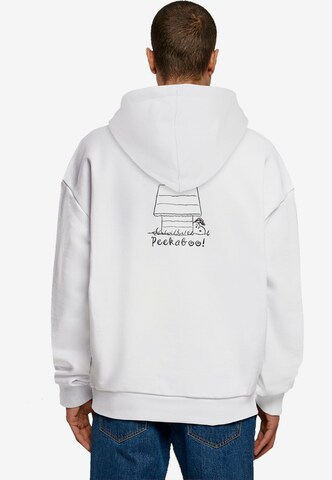 Sweat-shirt 'Peanuts - Peekaboo' Merchcode en blanc : devant