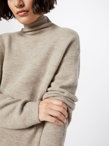 DRYKORN Pullover 'DRYKORN x ABOUT YOU  NEPHELI' in Beige