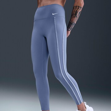 NIKE Skinny Workout Pants in Purple: front