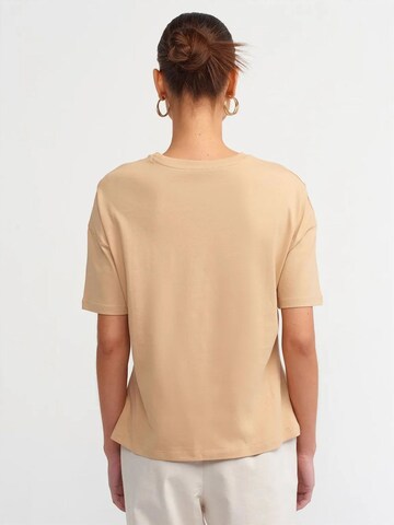 Maglietta di Dilvin in beige