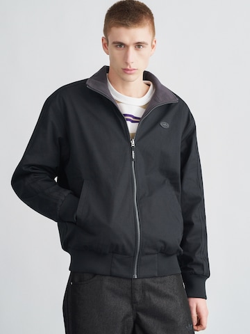 ADIDAS ORIGINALS Between-season jacket 'FIREBIRD' in Black: front