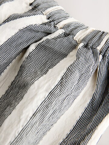 Next - Perna larga Calças em branco