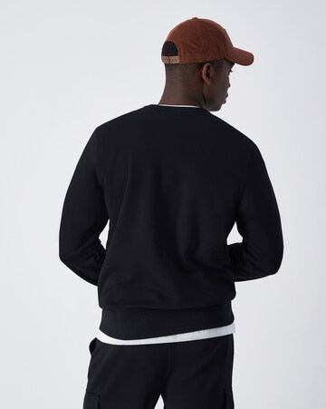 Felpa di Champion Authentic Athletic Apparel in nero