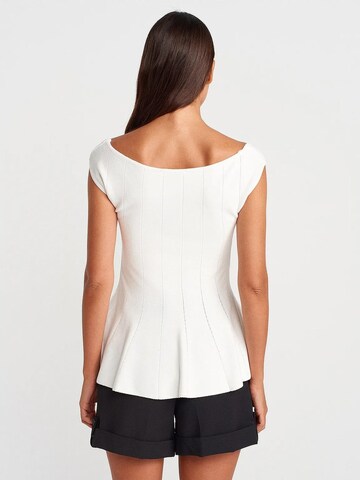 Top in maglia di Dilvin in bianco