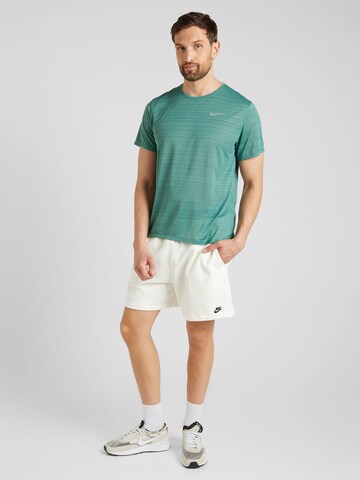 NIKE Funkční tričko 'Miler' – zelená
