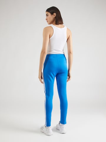 ADIDAS ORIGINALS - Slimfit Pantalón 'Adicolor Sst' en azul