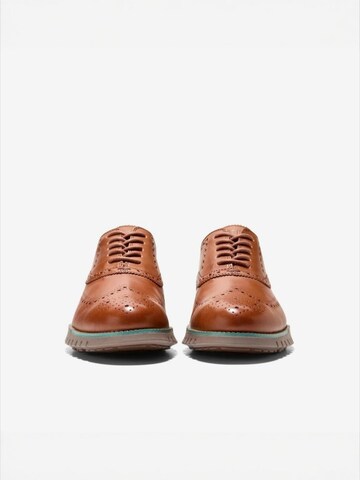 Cole Haan Nauhakengät 'ZG RMSTD WINGTIP OX' värissä ruskea