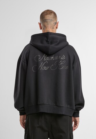 Veste de survêtement 'Retro Rhinestone' Karl Kani en noir