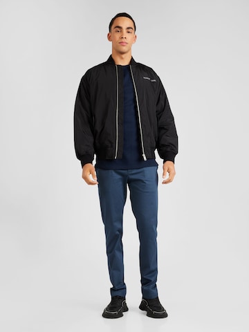 Veste mi-saison Tommy Jeans en noir