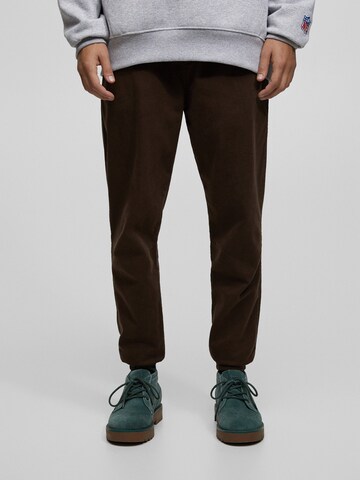 Pull&Bear Tapered Pants in Brown: front