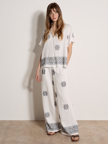 Chemisier ' ' Apricot en blanc