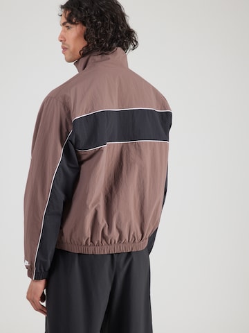 Nike Sportswear Kurtka przejściowa 'CLUB' w kolorze brązowy