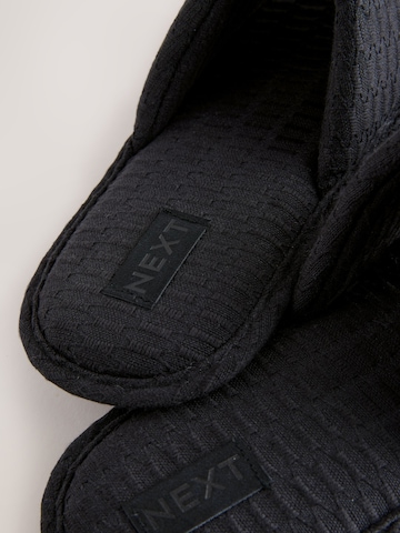 Pantoufle Next en noir