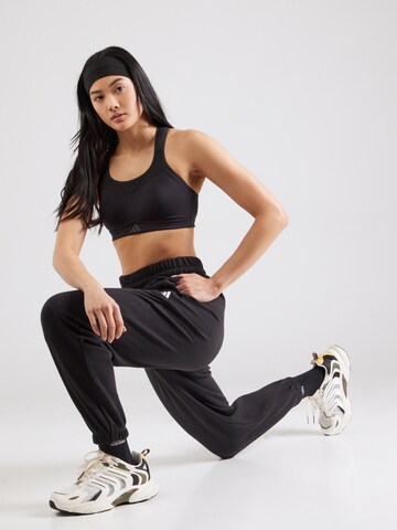 ADIDAS SPORTSWEAR Tapered Παντελόνι φόρμας 'Essentials' σε μαύρο