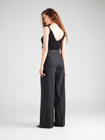 ABOUT YOU x Toni Garrn Wide leg Trousers with creases 'Linda' in Black