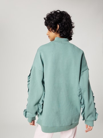 Sweat-shirt 'Orchid' florence by mills exclusive for ABOUT YOU en vert