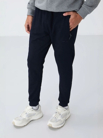 Regular Pantalon de sport Tommy Life en noir : devant