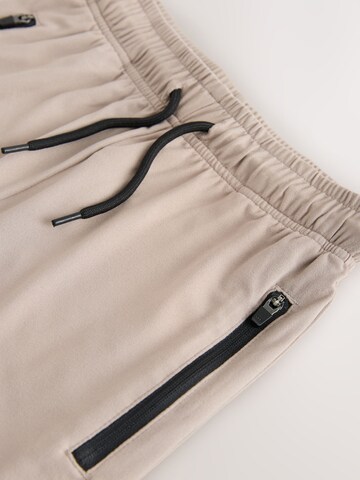 regular Pantaloni di Next in grigio