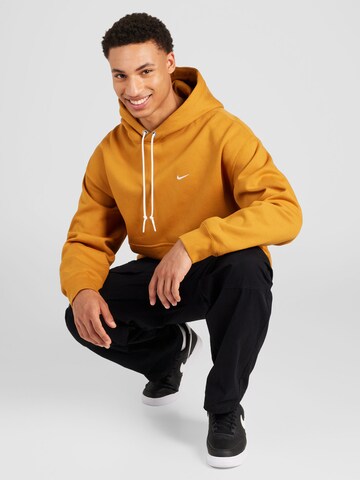 Nike Sportswear - Sweatshirt 'Swoosh' em amarelo