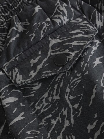 Next - Tapered Pantalón en negro