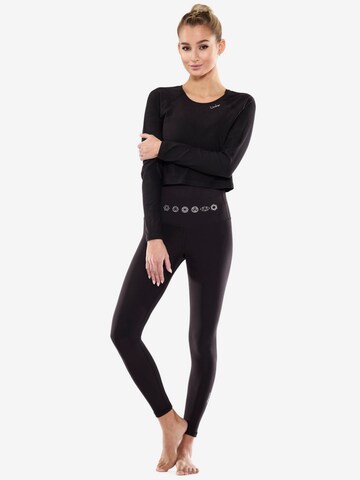 Winshape Skinny Spodnie sportowe 'HWL112C' w kolorze czarny