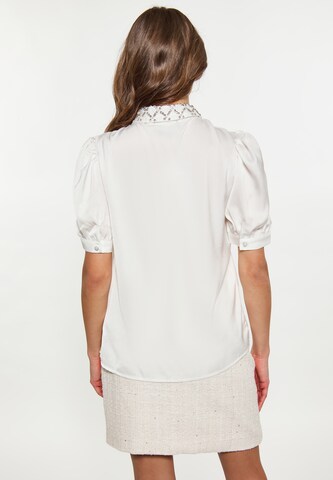 Camicia da donna di faina in bianco