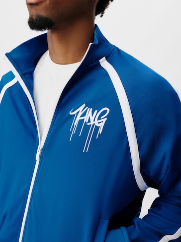 ABOUT YOU x Kingsley Coman - Sudadera con cremallera 'Dylan' en azul