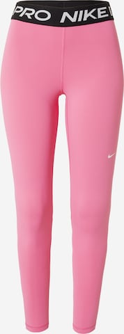 Skinny Pantalon de sport NIKE en rose : devant