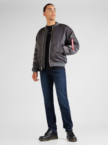 ALPHA INDUSTRIES Välikausitakki värissä harmaa