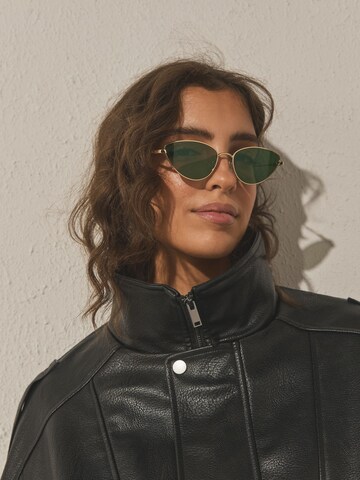 Next Zonnebril in Goud