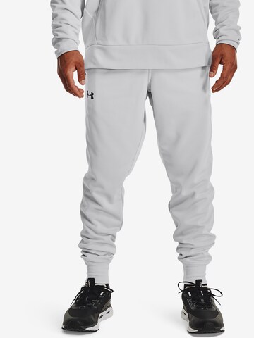 UNDER ARMOUR Tapered Sportbroek in Grijs: voorkant