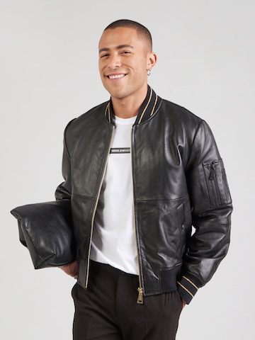Versace Jeans Couture - Chaqueta de entretiempo en negro: frente