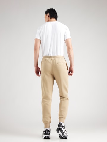 Nike Sportswear Tapered Trousers 'CLUB' in Beige