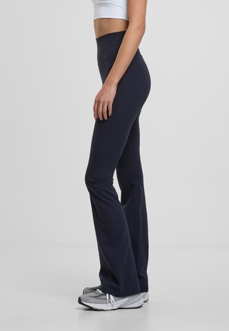 Flared Pantaloni sportivi di Aim'n in blu