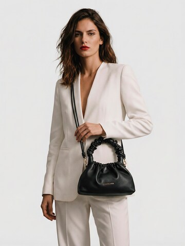 PLIEGO DE LA ROSA Handbag in Black