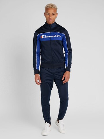 Champion Authentic Athletic Apparel Tracksuit in Blue: front