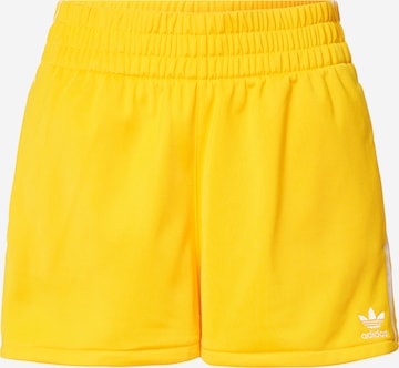 ADIDAS ORIGINALS - Loosefit Pantalón '3-Stripes' en amarillo: frente