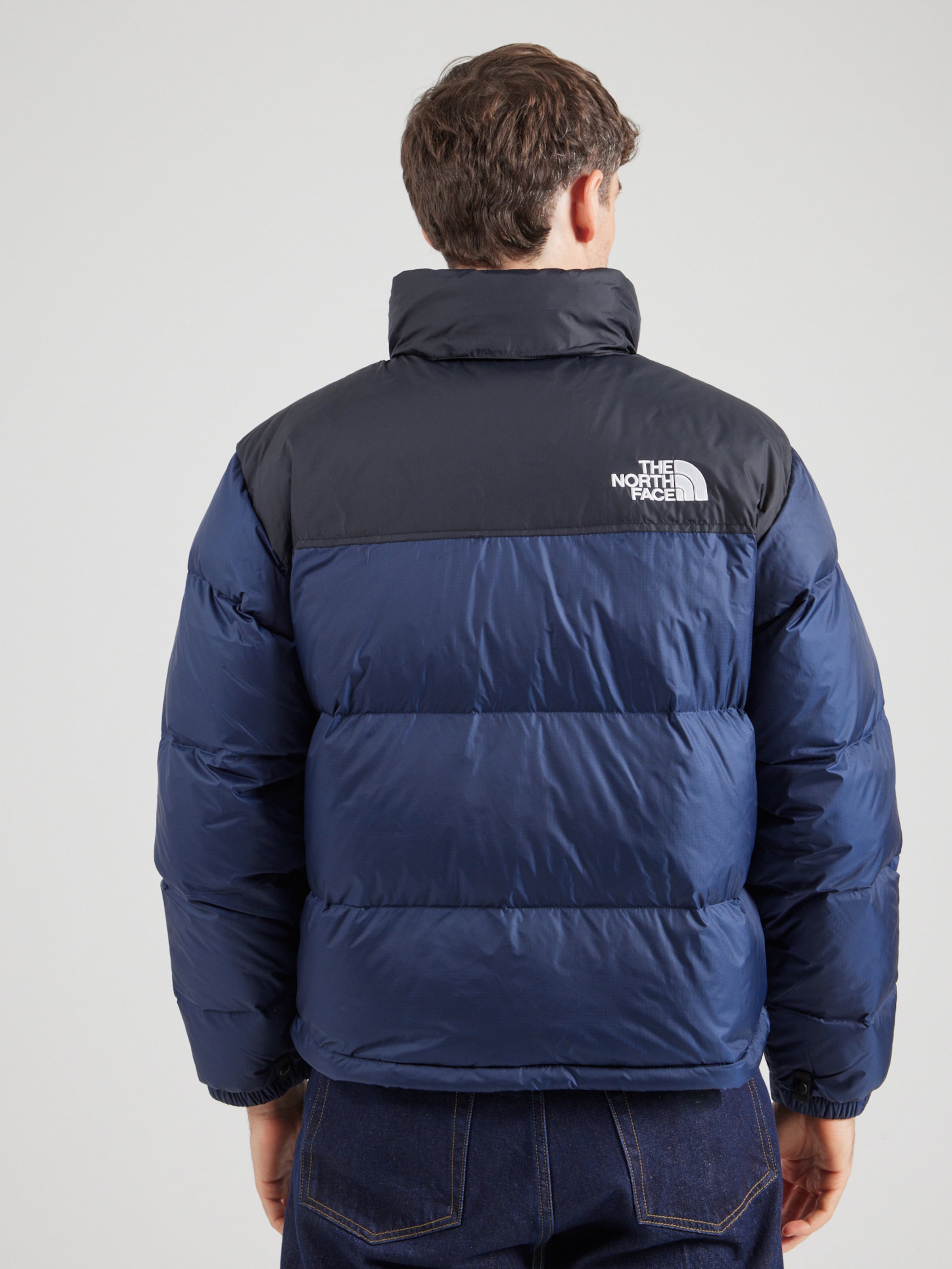 THE NORTH FACE Regular fit Winter jacket 1996 RTO NUPTSE in Navy Dark Blue ABOUT YOU