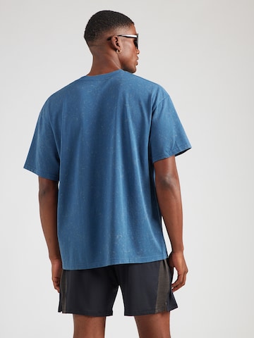 T-Shirt fonctionnel UNDER ARMOUR en bleu