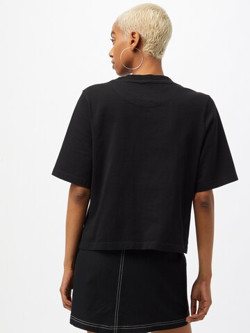 Maglietta di UNITED COLORS OF BENETTON in nero