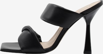 RISA Mules in Black: front