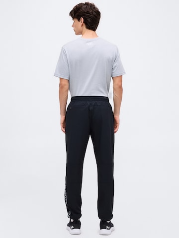 UNDER ARMOUR Tapered Sportbroek 'Tech Utility' in Zwart