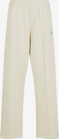 Karl Kani Loosefit Housut värissä beige: etupuoli