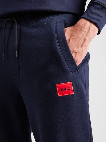 Tapered Pantaloni 'Doak' di HUGO in blu