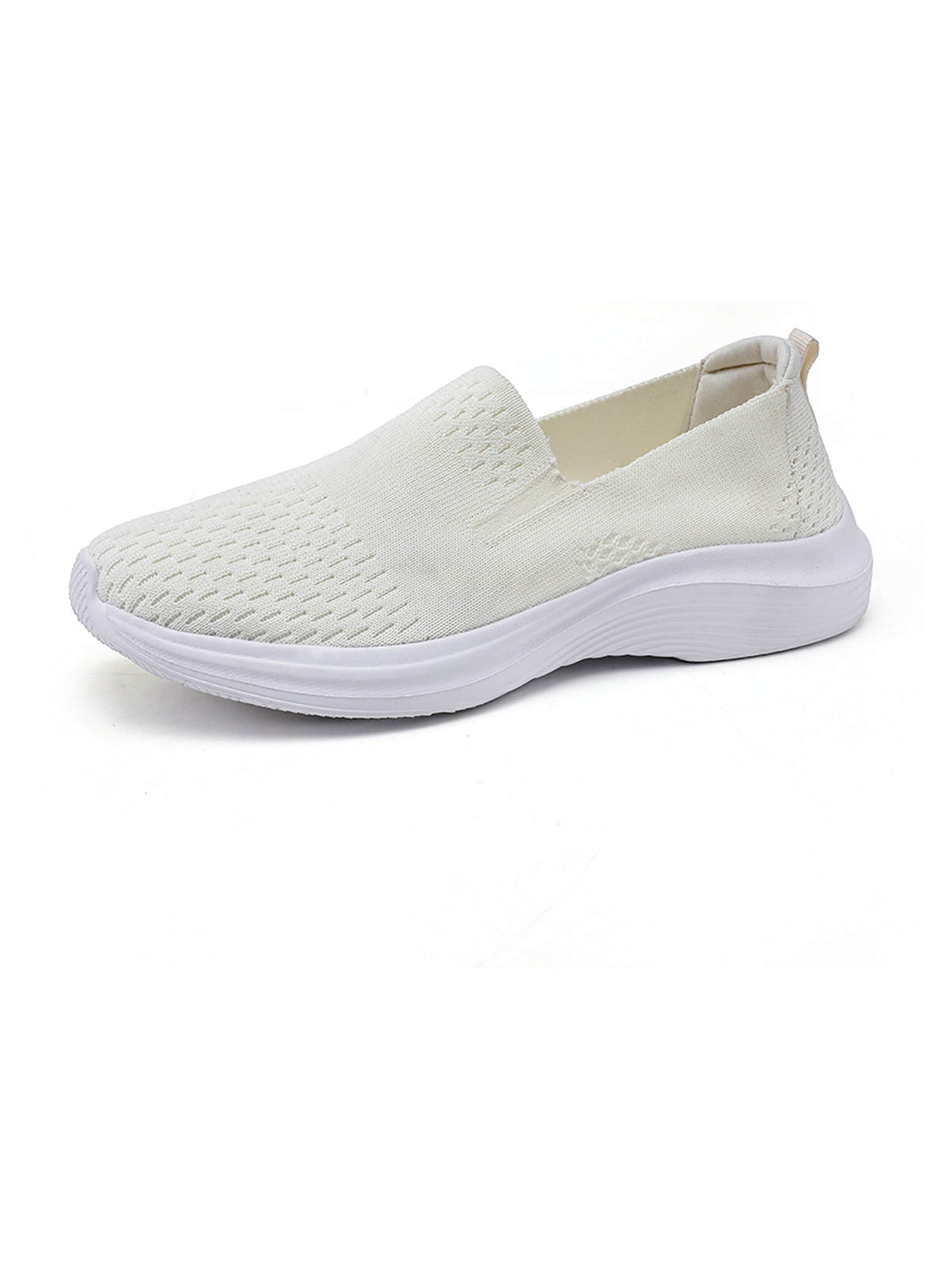 HUSKSWARE Slip-Ons in Beige: front