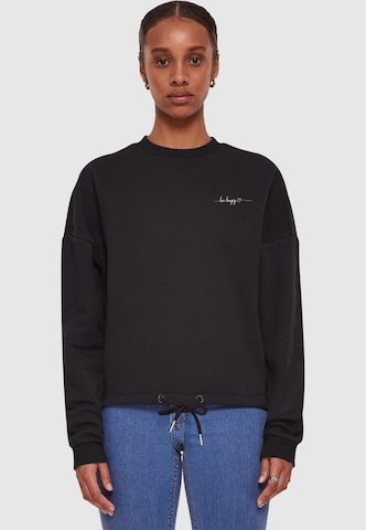 Merchcode Sweatshirt 'Be Happy' in Schwarz: Vorderseite