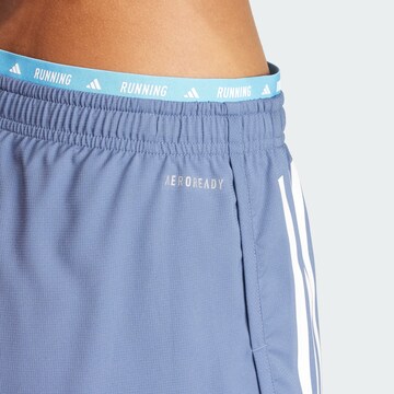 ADIDAS PERFORMANCESlimfit Sportske hlače 'Own The Run' - plava boja