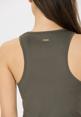 Athlecia Sports top 'Almi' in Brown