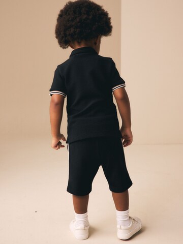 Next - Conjunto en negro